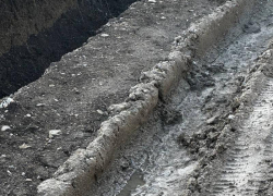 Дорога утонула после обустройства ливневки в Раевской